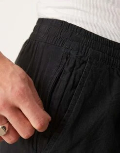 Abercrombie & Fitch Pull On Linen Pleated Loose Fit Trousers In Black For Men -Abercrombie and Fitch Fashion Shop 206654523 4