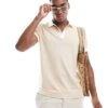 Abercrombie & Fitch Chic Icon Logo Texture Polo In Beige For Men Tan