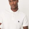 Abercrombie & Fitch Puff Icon Logo Short Sleeve Polo In White For Men